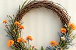 A vibrant embroidered wildflower wreath, offering a rustic and organic border.